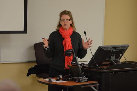 Katie Woodruff, associate director of athletics, speaks on "Sports as Character Formation" for the final lecture in this year's Town and Gown series. - Photo by Emily Stookey