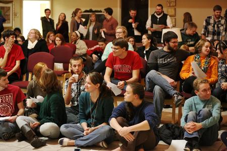 Students gather in McAfee Commons prior to Christmas with the Olivers. - Photo by Kristi McMurry Woody