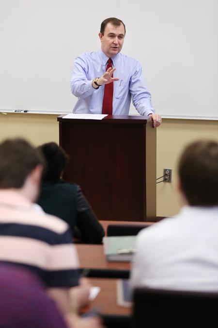 David Kuhl, Baptist Memorial Health Care Professor of Pharmacy, lectures to students during Elective in Infectious Disease class. - Photo by Kristi McMurry Woody