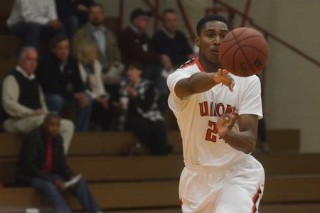 Ashanti Day, sophomore sport management major, passes the ball at a game against Lee University. - Photo by MiKalla Cotton