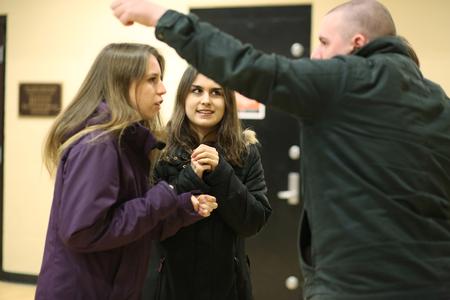 A team of students playing Union's version of The Amazing Race tries to work out their first clue. The game was organized by the Residence Life team. - Photo by Kristi McMurry Woody