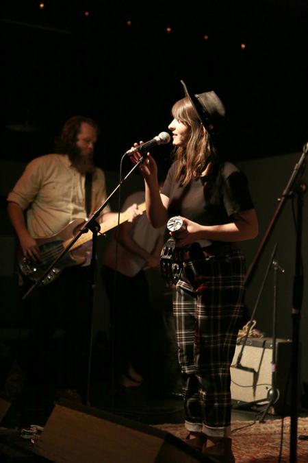 Casey Harper sings with Family and Friends, an Athens, GA, based group, in Barefoots Joe. - Photo by Kristi McMurry Woody