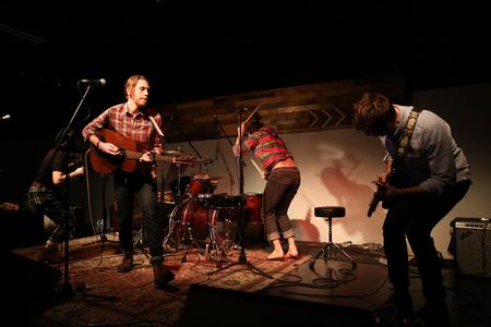 Family and Friends plays an energetic show in Barefoots Joe. The group is based in Athens, GA. - Photo by Kristi McMurry Woody