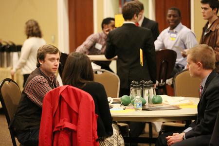 Dalton Lewis, senior biology major, talks with one of several company representatives at the College to Career event hosted by the Vocatio Center. - Photo by Kristi McMurry Woody