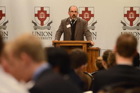 Scott Huelin, director of the honors community, speaks to prospective students at the Scholars of Excellence Banquet in the Carl Grant Events Center. - Photo by MiKalla Cotton
