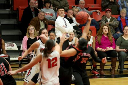 Mark Campbell, head coach, watches the Lady Bulldogs fight for a rebound against Valdosta State University Lady Blazers. - Photo by Kristi McMurry Woody