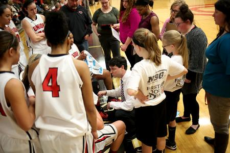 Mark Campbell, head coach, talks to his team during a time out.  - Photo by Kristi McMurry Woody