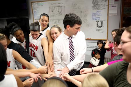 Mark Campbell, head coach, gathers with his players and supporters to celebrate their win against Valdosta State University. The game marked Campbell's 500th win as a head coach. - Photo by Kristi McMurry Woody