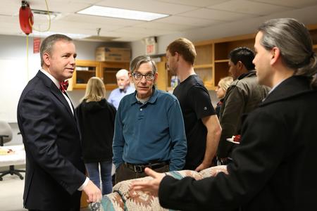 Dub Oliver, president of the university, David Ward, professor of physics, and Fonsie Guilaran, associate professor of physics, chat at the reception for National Engineering Week. - Photo by Kristi McMurry Woody