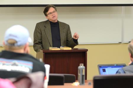 Arthur W. Hunt, associate professor of communications at the University of Tennessee at Martin, speaks in the Town and Gown lecture series in Providence Hall. - Photo by MiKalla Cotton