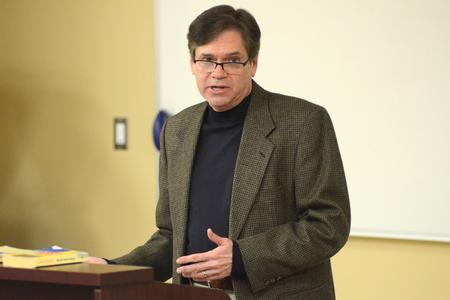 Arthur W. Hunt, associate professor of communications at the University of Tennessee at Martin, speaks to students in the Town and Gown lecture series in Providence Hall. - Photo by MiKalla Cotton