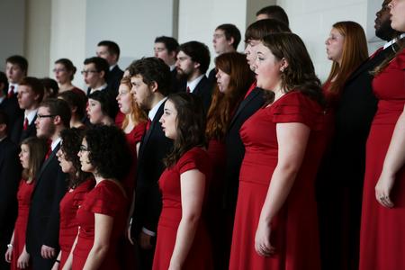 The University Singers practice for their tour in Hartley Recital Hall. - Photo by Kristi McMurry Woody