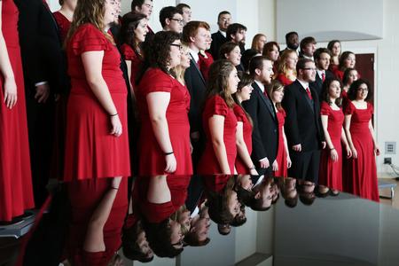 The University Singers practice for their tour in Hartley Recital Hall.  - Photo by Kristi McMurry Woody