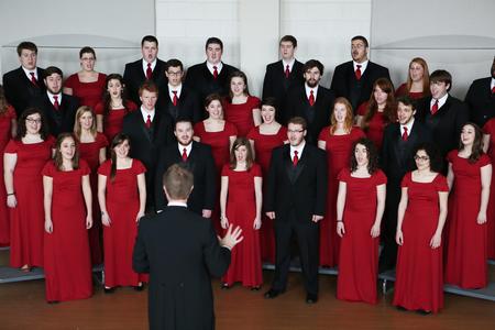 The University Singers practice for their tour in Hartley Recital Hall.  - Photo by Kristi McMurry Woody