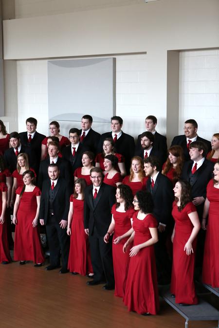 The University Singers practice for their tour in Hartley Recital Hall.  - Photo by Kristi McMurry Woody