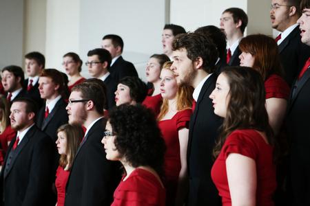 The University Singers practice for their tour in Hartley Recital Hall.  - Photo by Kristi McMurry Woody