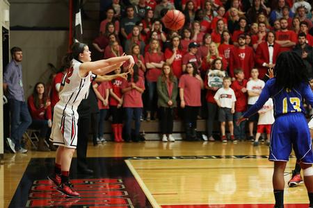 Kelsey Risner throws the ball in during the NCAA Division II South Region tournament quarterfinals.  - Photo by Kristi McMurry Woody