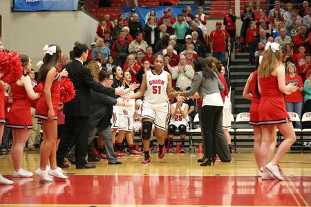 DeAnna Thompson runs out onto the court as a starter for the semifinal game of the NCAA Division II South Region Tournament.  - Photo by Kristi McMurry Woody