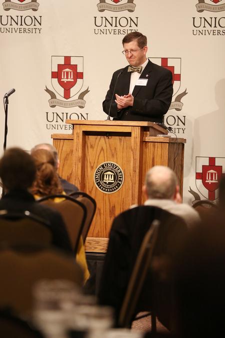 Ray Van Neste, professor of Biblical studies, welcomes guests to the Ryan Center Bible Conference. - Photo by Kristi McMurry Woody