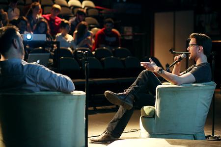 Timothy Simpson, senior media communications major, talks about his films after they were screened at the Student Film Festival. - Photo by Kristi McMurry Woody