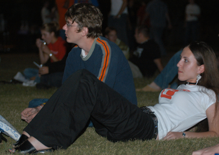 Freshmen Bryan Emerson & Laura Jackson take in some outdoor music during Fall Fest '04. - Photo by Jonathan Blair