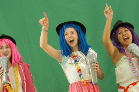 Stephanie Terrell, Lucretia Goddard, Nang Mitsamphanh perform in a green screen video during Fall Fest '04. - Photo by Jonathan Blair