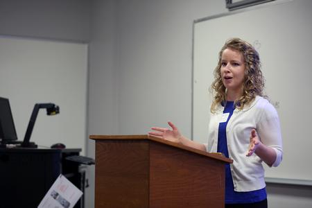 Bethany Kindt, junior art major, presents at the Twelfth Annual Scholarship Symposium about the importance of art education. - Photo by Amanda Rohde