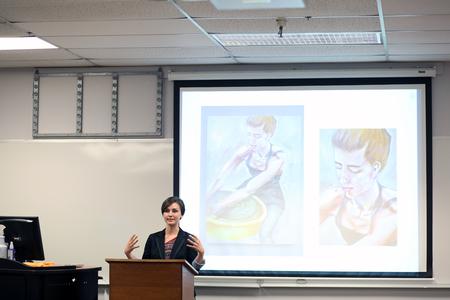 Katherine Murchison, junior art major, presents her talk entitled "Portraiture" at the Twelfth Annual Scholarship Symposium. - Photo by Amanda Rohde