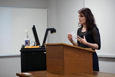 Karis Kontilis, junior art major, speaks on her study of concept design at the Twelfth Annual Scholarship Symposium. - Photo by Amanda Rohde