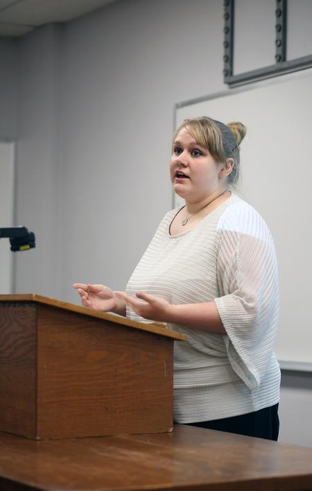Courtney Brown, senior art major, gives a presentation on Alexey Brodovitch at the Twelfth Annual Scholarship Symposium. - Photo by Amanda Rohde