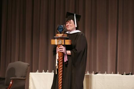 Ashley Blair, assistant professor of communication arts, prepared to recess from Awards Day chapel after being named the new Faculty Member of the Year. - Photo by Kristi McMurry Woody