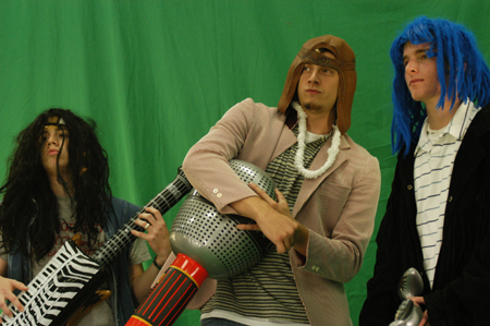 Freshmen Nathan Brewer, Joseph Lambach and Matt Pierce rock out at Fall Fest 2004. - Photo by Jonathan Blair