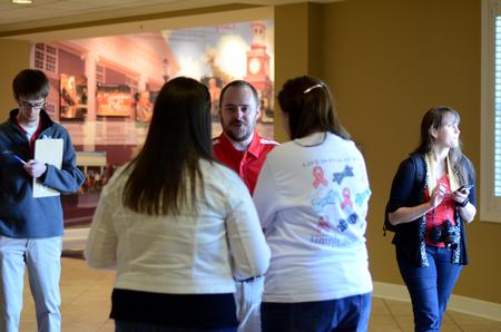 Will Brantley, senior enrollment counselor, welcomes new students to orientation at the Carl Grant Events Center. - Photo by Meg Rushing