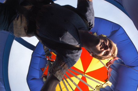 Senior Patrick Myers lets go in the parachute drop during Fall Fest '04. - Photo by Jonathan Blair