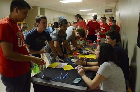New students fill out an orientation survey at the Student Organization Fair during Welcome Week. - Photo by MiKalla Cotton
