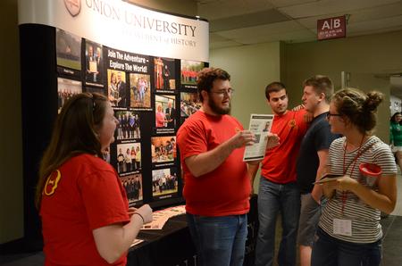Members of the history honor society, Phi Alpha Theta, talk to new students at the Student Organization Fair during Welcome Week in the Penick Academic Complex.  - Photo by MiKalla Cotton