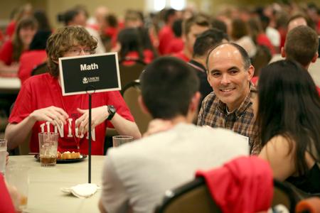 George Moss, associate professor of mathematics and department chair, speaks to new students interested in the math major during Dinner with your Department. - Photo by Kristi McMurry Woody