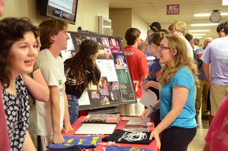 Members of the Union University Players talk to freshmen about the theatre department performances from the past year at the Student Organization Fair. - Photo by Elizabeth Wilson