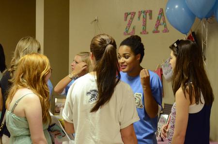 Morgan Moody, junior english major, talks to freshmen about Zeta Tau Alpha and Greek life at the Student Organization Fair. - Photo by Elizabeth Wilson