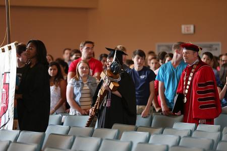Ashley Blair (center), faculty member of the year, processes into the chapel for Convocation. - Photo by Kristi McMurry Woody