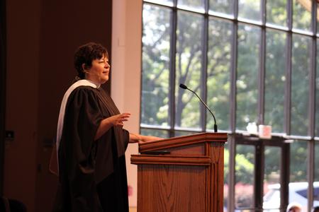 Ashley Blair, assistant professor of communication arts, gives an inspiring speech about persistence and courage in the G.M. Savage Memorial Chapel. - Photo by Sol Bee Park