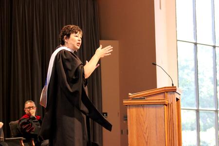 Ashley Blair, assistant professor of communication arts and faculty member of the year, passionately speaks about courage and not giving up during chapel. - Photo by Sol Bee Park