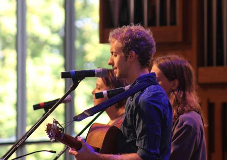 Zac Lancaster, senior art major, helps lead music during chapel. - Photo by Sol Bee Park
