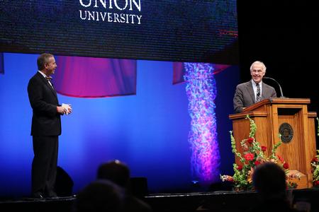 Dub Oliver, president of the university, asks speaker David Brooks questions from the audience at the conclusion of the 18th annual Scholarship Banquet. - Photo by Kristi McMurry Woody