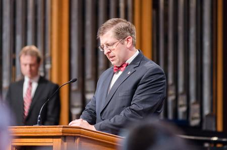Ray Van Neste, professor of Biblical studies, closes the 2015 homecoming chapel in prayer. - Photo by David Parks