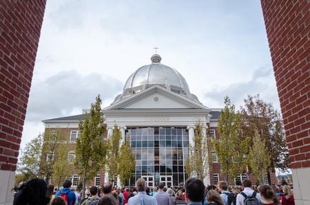 Hundreds gather to finally see the doors of the Logos open, partaking in its dedication ceremony. - Photo by David Parks