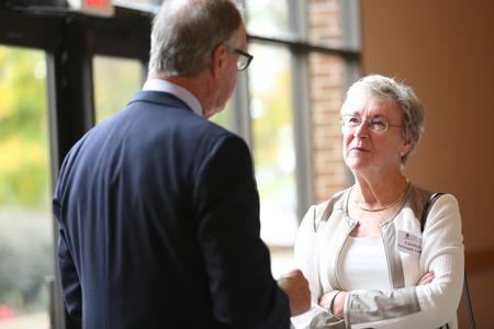 Carolyn Lott and Larry Alvey, both class of 1966 alums, chat together before the Homecoming chapel where they are recognized with the rest of their class.  - Photo by Kristi McMurry Woody