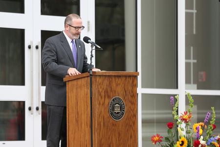 Nathan Finn, dean of the school of theology and missions, reads scripture during the dedication of The Logos.  - Photo by Kristi McMurry Woody