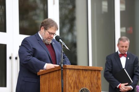Ben Mitchell, provost, prays at the conclusion of the dedication of The Logos.  - Photo by Kristi McMurry Woody