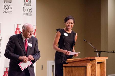 After a welcome by Bob Agee, vice president for institutional advancement, invocation is brought by H.J., Student Government Association president, during the Meritorious Service Awards Banquet in the Carl Grant Events Center. - Photo by David Parks
